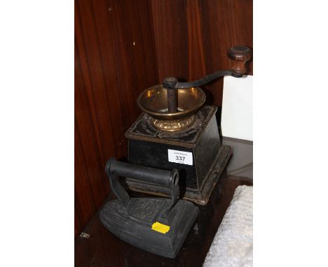 A VINTAGE TABLETOP GRINDER TOGETHER WITH A VINTAGE IRON WITH STAFFORDSHIRE KNOT DETAIL 