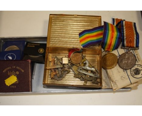 A TIN OF MEDALS AWARDED TO 36772 PTE R B NAYLOR WEST YORKSHIRE REGIMENT TOGETHER WITH CAP BADGES AND COINS ETC