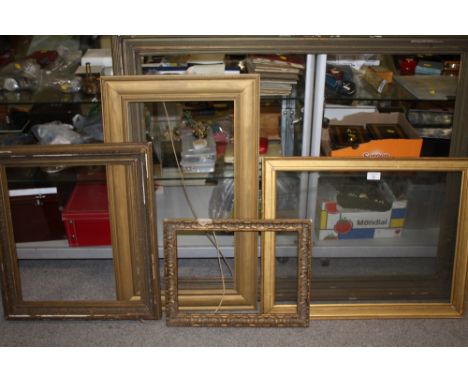 A COLLECTION OF FIVE ANTIQUE AND VINTAGE GILT PICTURE FRAMES