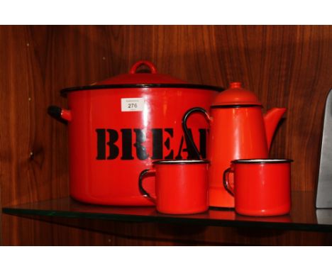 AN ENAMEL BREAD BIN TOGETHER WITH AN ENAMEL COFFEE POT AND TO MUGS