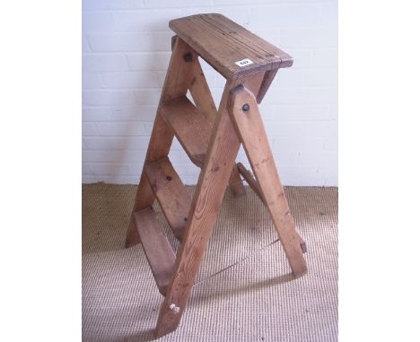 A stripped and waxed pine step ladder