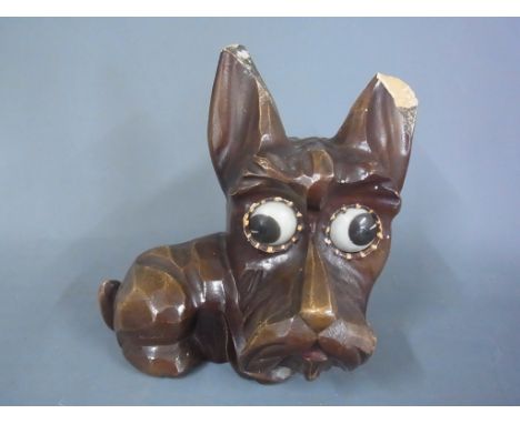 A Scottie dog wood effect German rolling eye mantle clock - not working, chips to ears