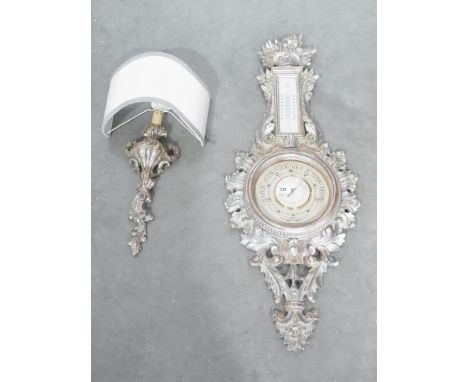 A modern decorative gilt wood barometer thermometer and matching wall light - 102cm and 60 tall
