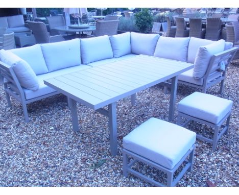 A Bramblecrest Norfolk aluminium sofa set with casual dining table, casual dining stool, parasol and base