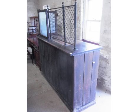 An interesting Victorian pine Post Office counter with two glazed panels and grill work with two drawers and shelf behind - r