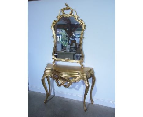 A modern giltwood consul table with an ornate mirror - Height 201cm x Width 105cm