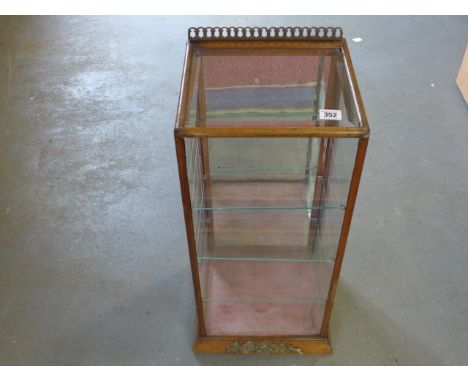 A display cabinet, mirror backed with three glass shelves to interior 