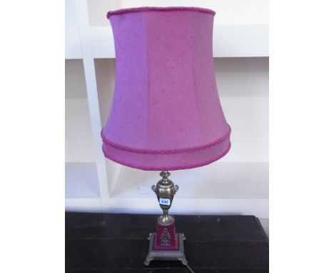 An ornate brass and maroon decorated table lamp - Height 70cm