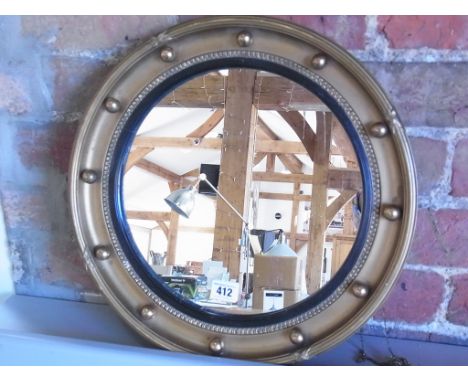 A gilt bachelors mirror - Diameter 40cm