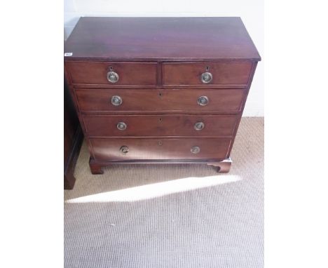 A mahogany chest with two short over three long drawers on shaped bracket feet - Height 80cm x Width 84cm x Depth 43cm