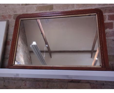 A Victorian walnut over mantle mirror - 64cm x 100cm
