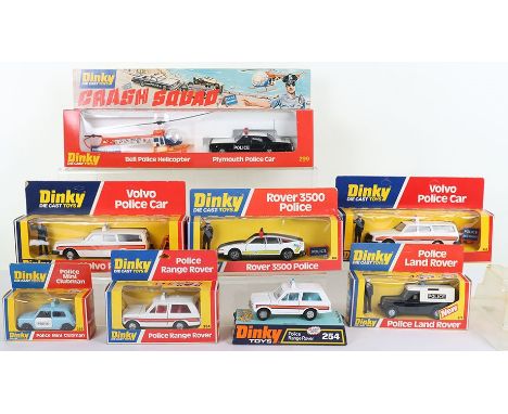 A Collection of Boxed Dinky Toys Police Vehicles, 243 Volvo Police Car, with red interior, 243 Volvo Police Car, with tan int