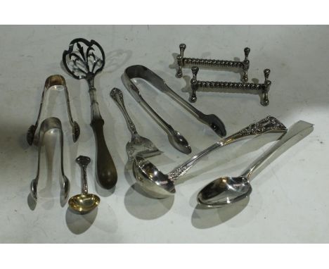 A William IV Kings pattern ladle, Glasgow 1836; a silver cream scoop, Birmingham 1900;    a silver Old English pattern tea sp
