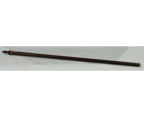 Coal Mining - a novelty walking cane, the pommel carved as a miner, the collier stands with helmet lamp and shovel 