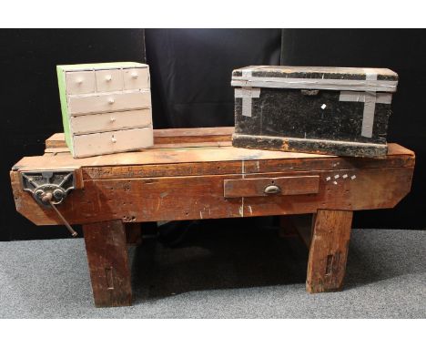 A multi level work bench,  fitted Woden 189B No3 vice, 215cm long, 86cm high, 75cm deep;  a tool chest trunk;  painted pine s