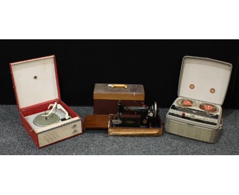 A portable Marconiphone; a reel-to-reel recorder; a Singer sewing machime (3) 