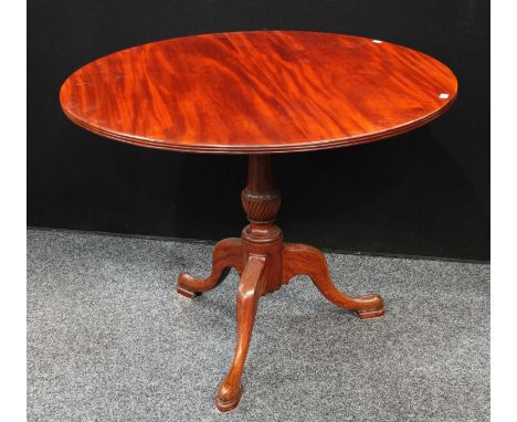 A George III style tripod supper table, cabriole legs, 91cm wide. 