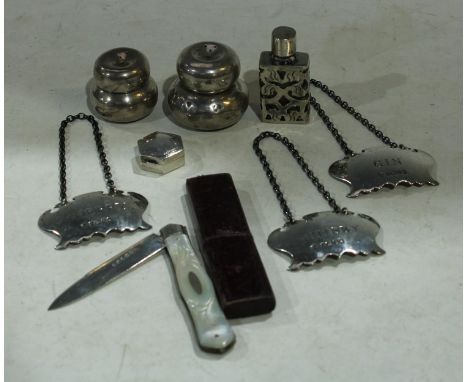Three silver cartouche shaped decanter labels, Whisky, Sherry and Gin, Sheffield 1977; a pair of silver double bun shaped sal