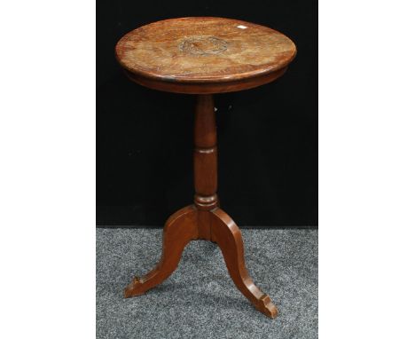 An unusual early 19th century oak tripod table, the centre carved with acorns and oak leaves, In Mem, encircled with a list o