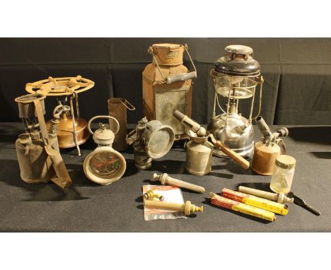 A Tilley lamp, spares and dip-stick; a Swedish Primus stove; cycle lamps; two blow torches; lantern; etc 