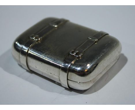 A Victorian novelty vesta case, as a travelling trunk, faux leather straps, spring loaded mechanism, striker to verso, gilt i