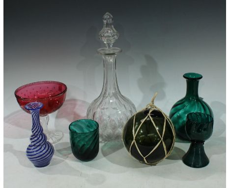 Glassware - an emerald glass decanter;  a similar wrythen beaker;  a witches ball;  a clear glass decanter;  a 20th century c