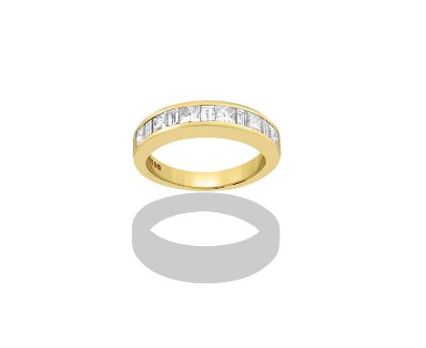 An 18 Carat Gold Diamond Half Hoop Ringsix princess cut diamonds alternate with five baguette cut diamonds, in a yellow chann