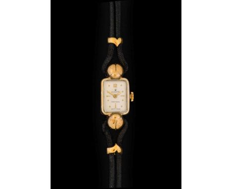 Rolex: A Lady's 9 Carat Gold Rectangular Wristwatch with Unusual "Ladybird" Shaped Lugs, signed Rolex, model: Precision, ref:
