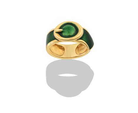 An Enamel Ring, by FRED Paristhe buckle motif enamelled in green with a yellow plain polished borderfinger size I1/2The ring 