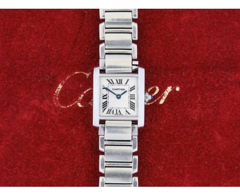 Cartier: A Lady's Stainless Steel Wristwatch, signed Cartier, Model: Tank Francaise, circa 2000, quartz movement, silvered di