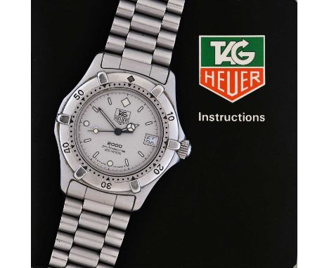 Tag Heuer: A Stainless Steel Calendar Centre Seconds Wristwatch, signed Tag Heuer, Professional 200 meters, model: 2000, circ