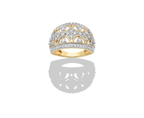 A Diamond Ringfive graduated clusters spaced by trios of round brilliant cut diamonds, to an openwork border terminating to r