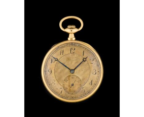 Tiffany & Co: An 18 Carat Gold Open Faced Pocket Watch, retailed by Tiffany & Co, circa 1920, manual wound lever movement, sp