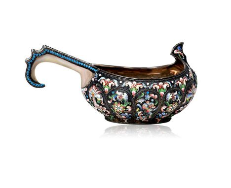 of typical form with angular handle, overall decorated with shaded vari-colour cloisonne enamel flowers and foliage on a matt