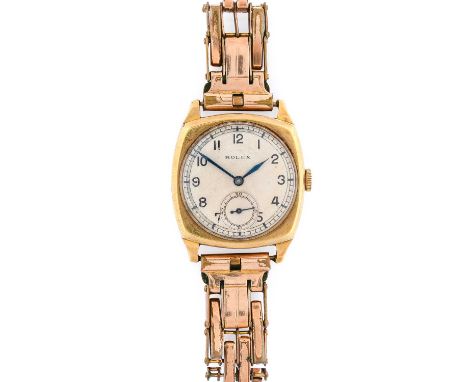 Rolex: A 9 Carat Gold Cushion Shaped Wristwatch, signed Rolex, ref: 2988, 1936, manual wound lever movement signed Rolex, sil