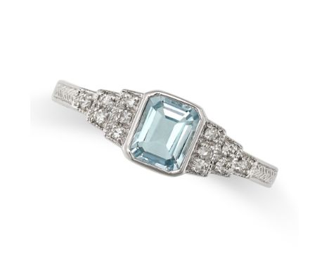 AN AQUAMARINE AND DIAMOND RING in 18ct white gold, set with an octagonal step cut aquamarine, the stepped shoulders accented 
