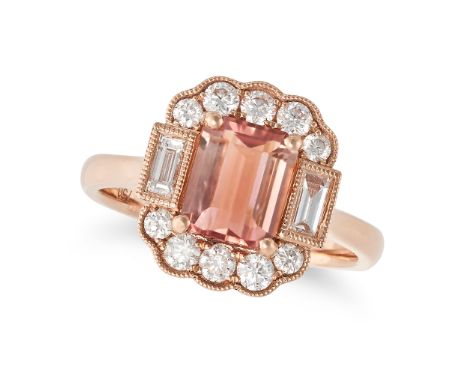 A PINK TOURMALINE AND DIAMOND CLUSTER RING in 18ct rose gold, set with an octagonal step cut pink tourmaline in a cluster of 