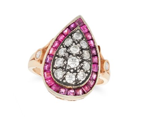 A RUBY AND DIAMOND DRESS RING the pear shaped face set with a cluster of round brilliant cut diamonds in a border of calibre 