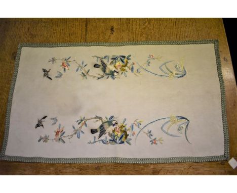 A Chinese silk embroidered panel of birds and butterflies, 64.5 x 36.5cm.&nbsp; 
