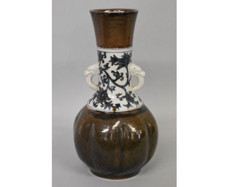 An unusual Chinese or Japanese twin handled baluster vase,&nbsp;six character seal mark to base, the body of octafoil form, 2