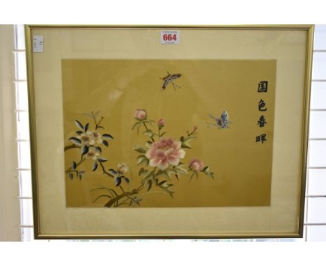 A Chinese silk embroidered panel of butterflies and flowers,&nbsp;25 x 35.5cm.&nbsp; 
