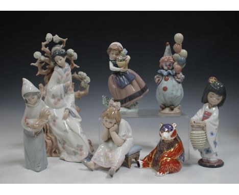 Six Lladro figures, comprising Oriental Lantern, No. 6231, Littlest Clown, No. 5811, Nothing to Do, No. 5649, Girl with Chick