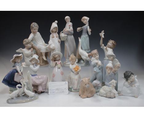 Twelve Lladro ornaments, including Little Rose Girl, No. 8042, Valencia Girl, No. 4841, a brown bear, No. 1206, Thinking Ange