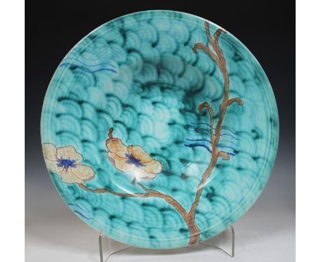 A large Clarice Cliff Bizarre Inspiration circular charger, circa 1930, painted with a rare variant of the Inspiration Rose p