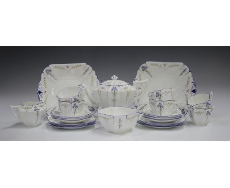 A Shelley Queen Anne shape Blue Iris pattern part tea service, 1925-40, comprising teapot and cover, milk jug, sugar bowl, tw