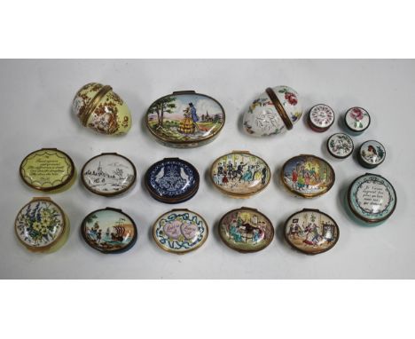 Eighteen Halcyon Days enamel boxes, including two egg shaped examples, four Christmas boxes and four pill boxes (minor faults