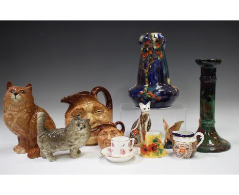 A mixed collection of decorative and collectable pottery and porcelain, late 19th and 20th century, including a Carlton Ware 