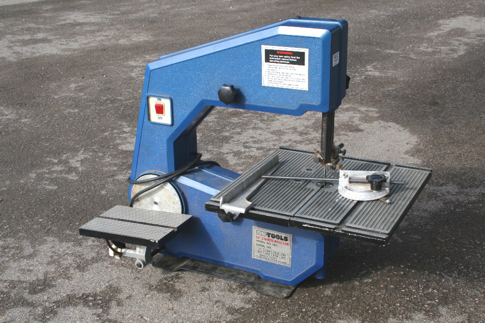 A NUTOOL bandsaw with sanding attachment