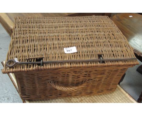 Small single handled wicker picnic hamper.