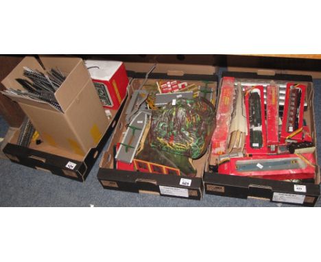Three trays of assorted 00 Gauge trains and rolling stock to include Gornby carriages, R.065 evening star in original box, te